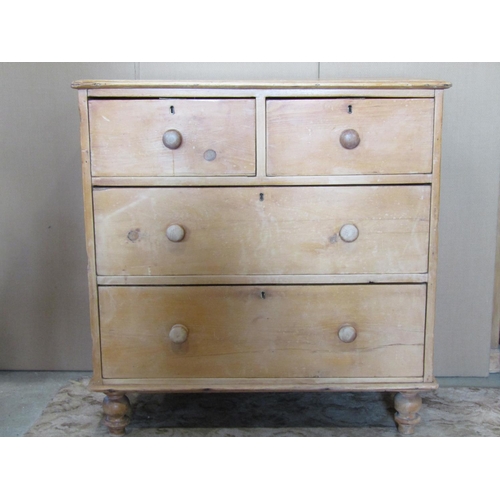 3125 - A stripped and waxed pine chest of two long and two short drawers on turned supports, 92 cm wide