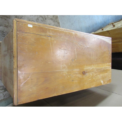 3125 - A stripped and waxed pine chest of two long and two short drawers on turned supports, 92 cm wide