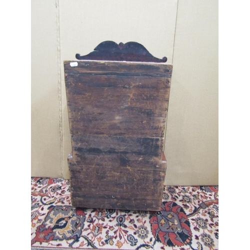 3517 - A miniature 19th century mahogany cabinet, the lower section enclosed by one long and two short draw... 