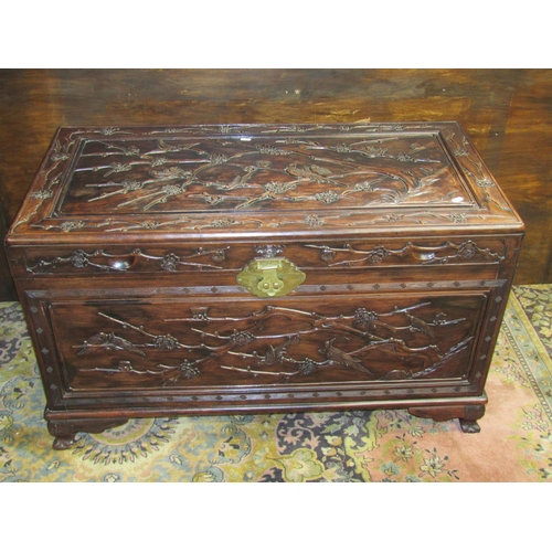 3521 - A good quality Chinese camphor lined hard wood coffer with finish and hawthorn bough repeating detai... 