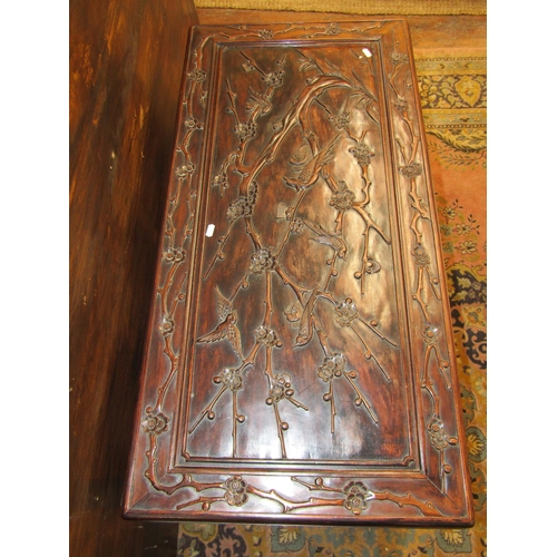 3521 - A good quality Chinese camphor lined hard wood coffer with finish and hawthorn bough repeating detai... 