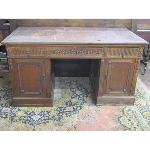 3537 - A late 19th century pale mahogany pedestal writing desk, each pedestal fitted with three deep drawer... 