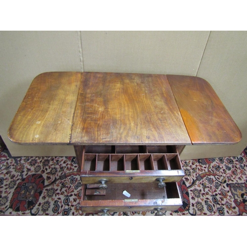 3545 - A Regency mahogany ladies drop leaf sewing table fitted with two frieze drawers on square tapered le... 