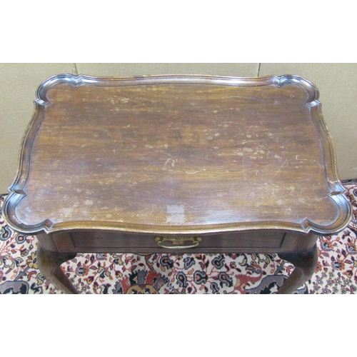 3562 - A late 19th century silver table the shaped gallery top over a single frieze drawer and four cabriol... 