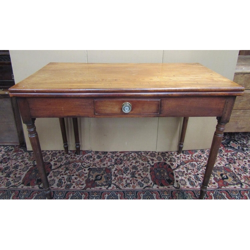 3567 - An early 19th century mahogany cottage fold over top dining table with simple frieze drawer on four ... 