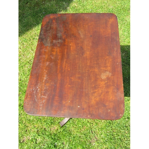 3570 - A Georgian mahogany occasional table the rectangular top raised on a vase shaped pillar and tripod, ... 