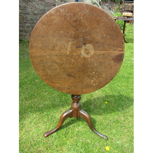 3576 - A Georgian oak country made snaptop occasional table on a vase shaped pillar and tripod base, 61 cm ... 