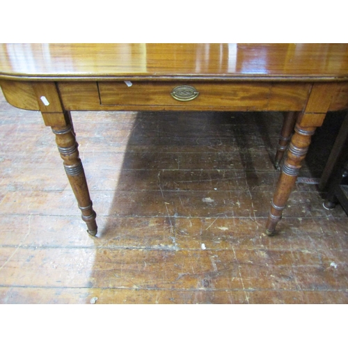 3584 - A Georgian mahogany D end dining table with central leaf raised on eight turned supports (can be use... 