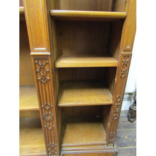 3592 - A substantial five sectional oak library bookcase of full height, five bays enclosing adjustable she... 