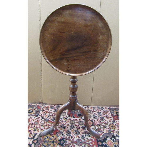 3600 - A Georgian mahogany occasional table, the dished top raised on a turned pillar and tripod base, 45 c... 