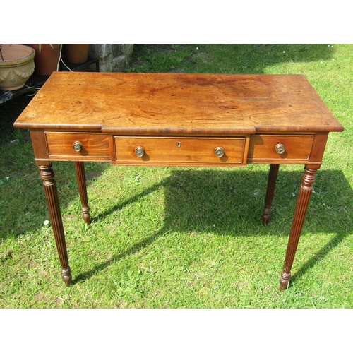 3628 - Regency period mahogany breakfront writing table fitted with three drawers on four turned tapered an... 