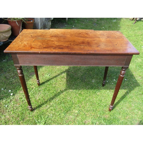 3628 - Regency period mahogany breakfront writing table fitted with three drawers on four turned tapered an... 