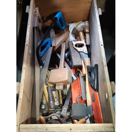 3076 - An ex military travelling trunk containing a good selection of hand tools mainly woodworking togethe... 