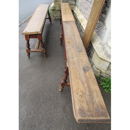 3635 - A 19th century oak bench/form raised on six turned supports, 270 cm length and a further matching ex... 