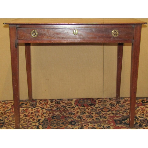 3571 - A Georgian mahogany side table of simple form with shallow frieze drawers on square taper legs, 77 c... 