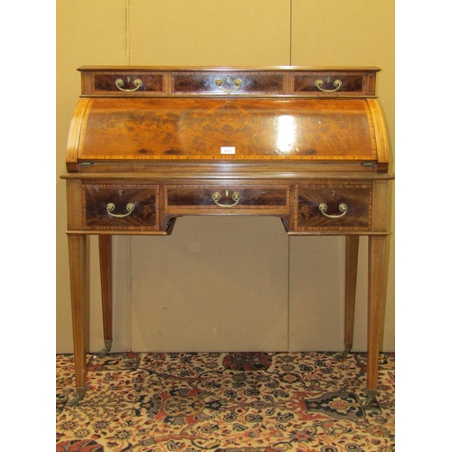 3577 - A good quality Edwardian mahogany ladies cylinder top writing desk, the fall flap enclosing a fitted... 