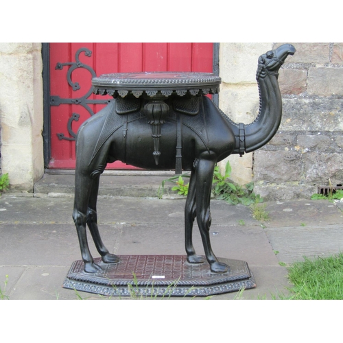 3638 - 19th century Anglo Indian carved camel table, with shaped tray top, on a fully carved base, 73cm hig...