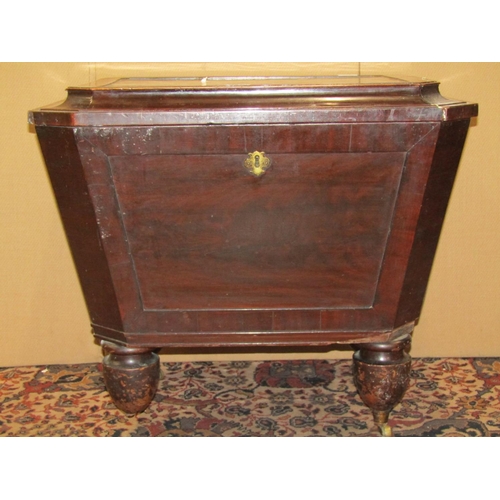 3606 - A Regency  mahogany wine cooler of rectangular and tapering form with lead lined interior - for twel... 