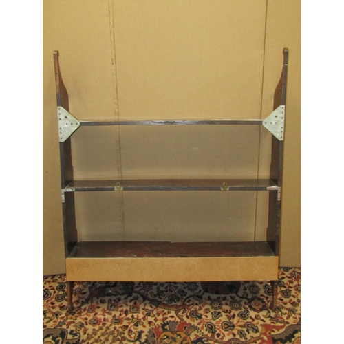 3611 - A Georgian mahogany wall shelf incorporating a pair of frieze drawers on shaped brackets, 81 cm wide