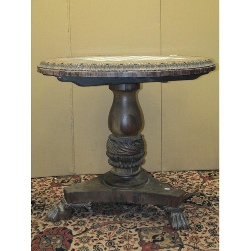 3624 - An Indian Colonial hardwood centre table on platform base, turned and carved column supporting circu... 