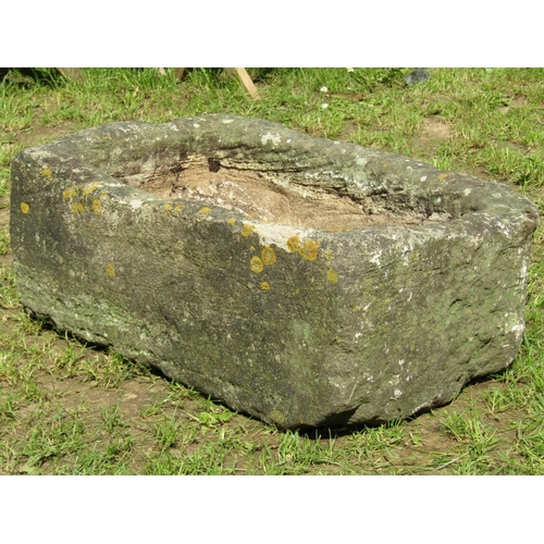 697 - A weathered rectangular carved natural stone trough with drainage hole 76cm long x 46cm wide x 29cm ... 