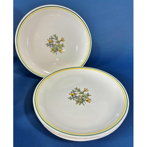 1099 - A Bristol Pottery Meadow Vetch pattern dinner service comprising dinner plates, side plates, bowls, ... 