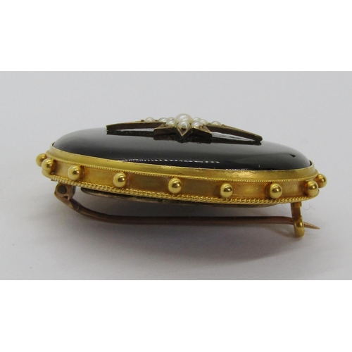 1241 - Victorian yellow metal onyx mourning brooch with central star motif set with seed pearls and beaded ... 