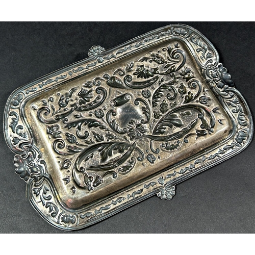 1199 - A silver pen tray decorated with green man masks, Birmingham 1902, maker Henry Charles Freeman and a... 