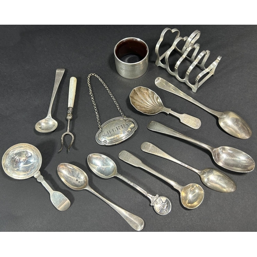 1201 - A small silver toast rack, a silver napkin ring with a bakelite liner, a sherry drinks label and an ... 