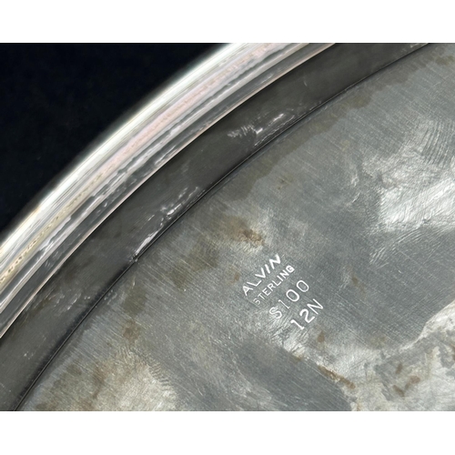 1219 - An American Sterling Silver circular tray stamped Alvin, 30.5th diam, 18 oz approx.