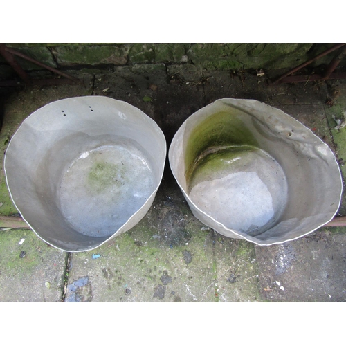 2020 - A pair of outsized aluminium pans (af) approx 60cm diameter x 30cm high