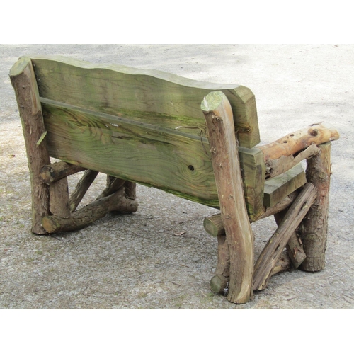 2046 - A rustic wooden garden bench with plank seat, 145 cm wide