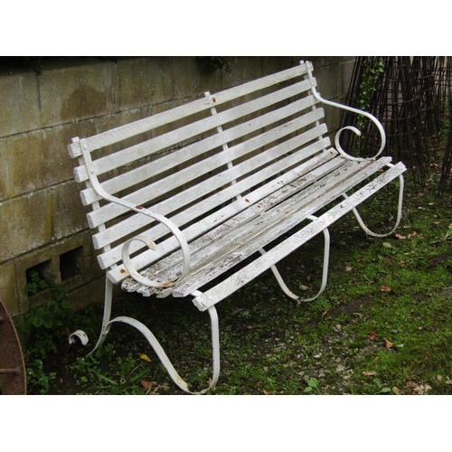 2070 - A vintage sprung steel garden bench with wooden lathes and painted finish, 185 cm long