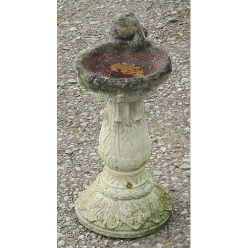 2039 - A small collection of weathered cast composition stone garden ornaments in the form of frogs, two se... 