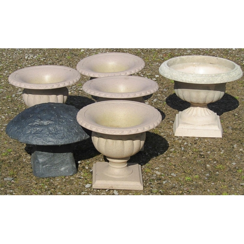 2040A - A set of four moulded plastic to simulate marble garden urns of classical circular lobed form 40 cm ... 