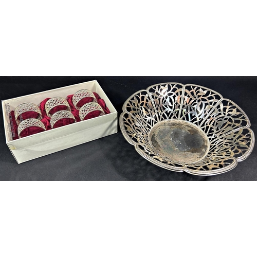 1161 - A four piece silver plated tea service, an oval silver plated tray with filigree detail to the galle... 