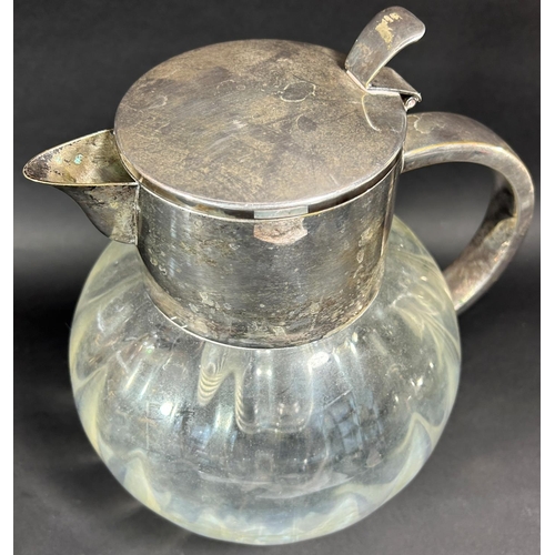 1179 - A faintly gourd shaped silver plated mounted glass water jug with an inner, removable,  ice cooler a... 