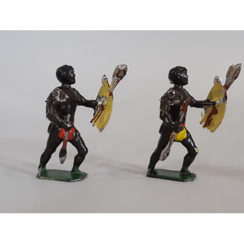 283 - 10 cast lead figures of Zulu warriors by Hanks Sutton circa 1929, each with moveable right arm (2 de... 