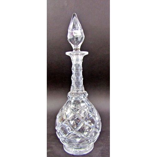 1127 - A pair of rounded cut glass decanters and a third similar, with a single hallmarked silver Madeira l... 