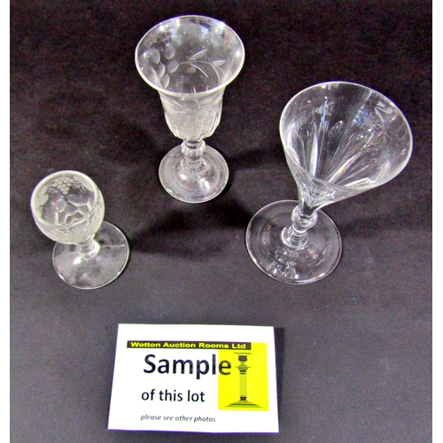 1129 - A good selection of 18th and 19th century glassware, including six matching wine glasses, several st... 