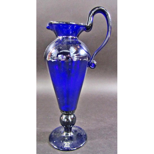 1133 - An elegant Bristol Blue Glass pitcher, 16cm high.