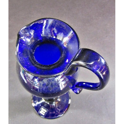 1133 - An elegant Bristol Blue Glass pitcher, 16cm high.