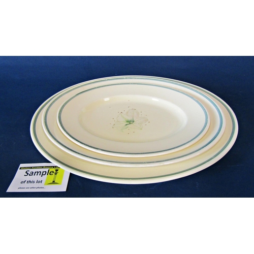 1003 - A Susie Cooper floral patterned dinner service with green banded borders comprising dinner plates, g... 