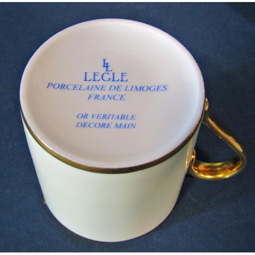 1004 - A collection of gilt edged Legle Limoges porcelain coffee and dinner wares comprising three lidded t... 