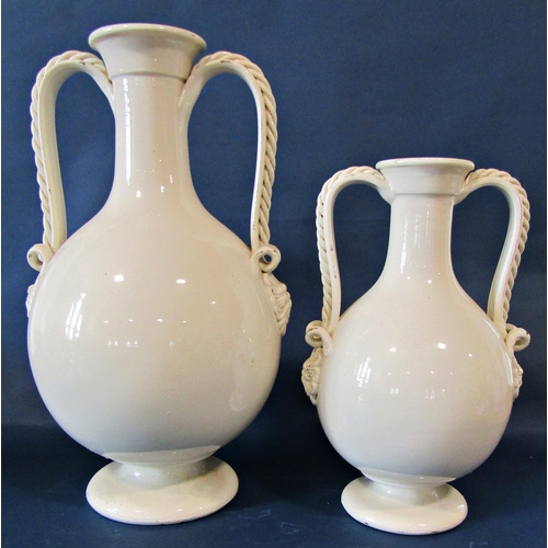 1010 - Two creamware crackle glazed large vases with drawn necks, decorated in relief with scrolling handle... 