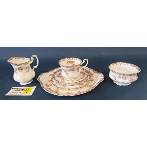 1019 - A collection of Royal Albert tea wares in the Dimity Rose pattern to include two milk jugs, two suga... 