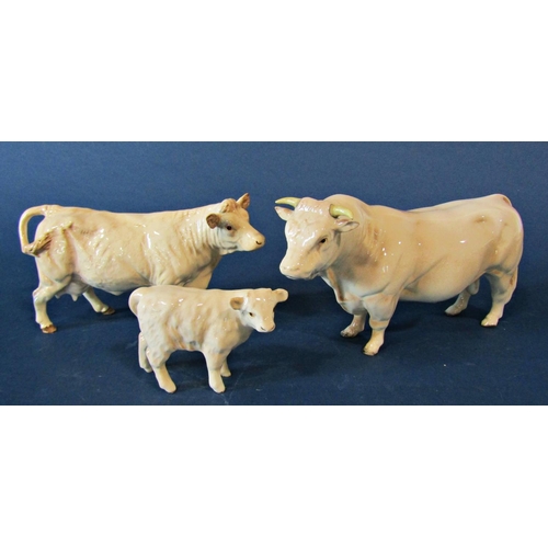 1056 - A collection of Beswick farm animals to include family group of Ayrshire cattle, family group of Cha... 