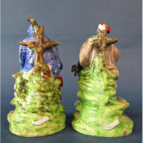 1059 - Two early Staffordshire figures - Elijah and The Widow with Walton scroll marks to the reverse of ea... 