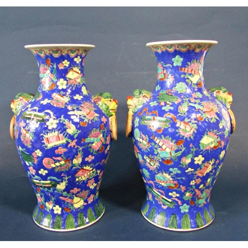 1088 - Pair of 20th Century Chinese Porcelain Baluster Vases, decorated with ornaments and flowers on a blu... 