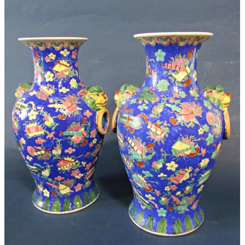 1088 - Pair of 20th Century Chinese Porcelain Baluster Vases, decorated with ornaments and flowers on a blu... 